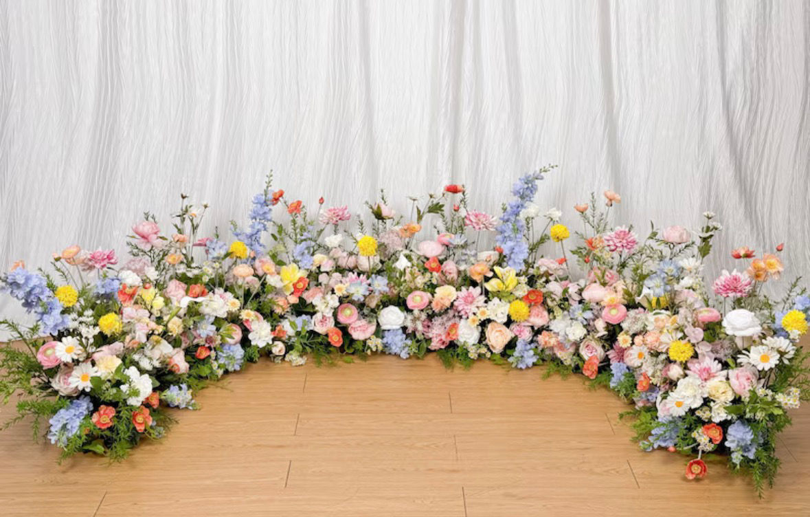 Pastel wildflower ground arch 