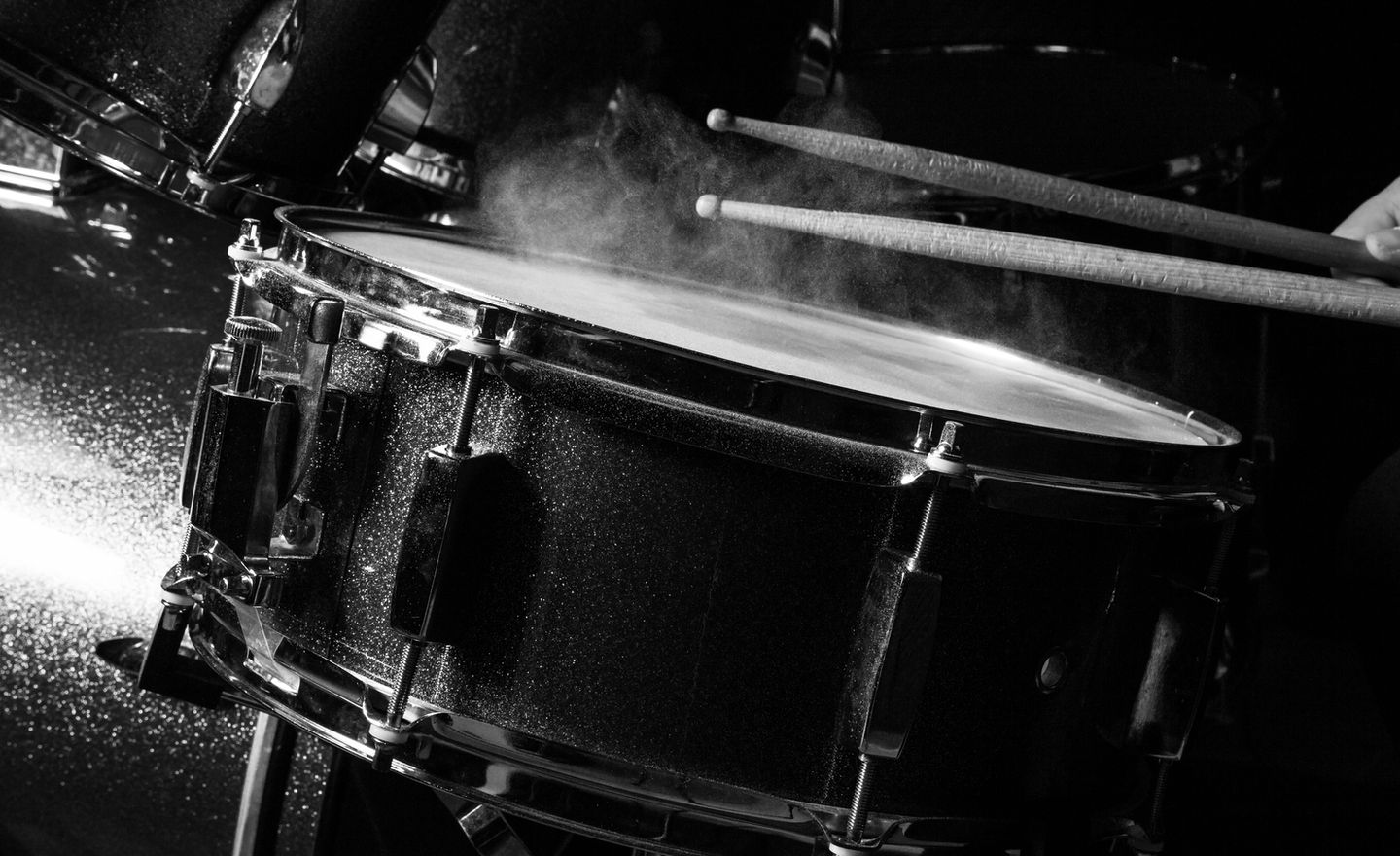 Close-up of a snare drum and drumsticks
