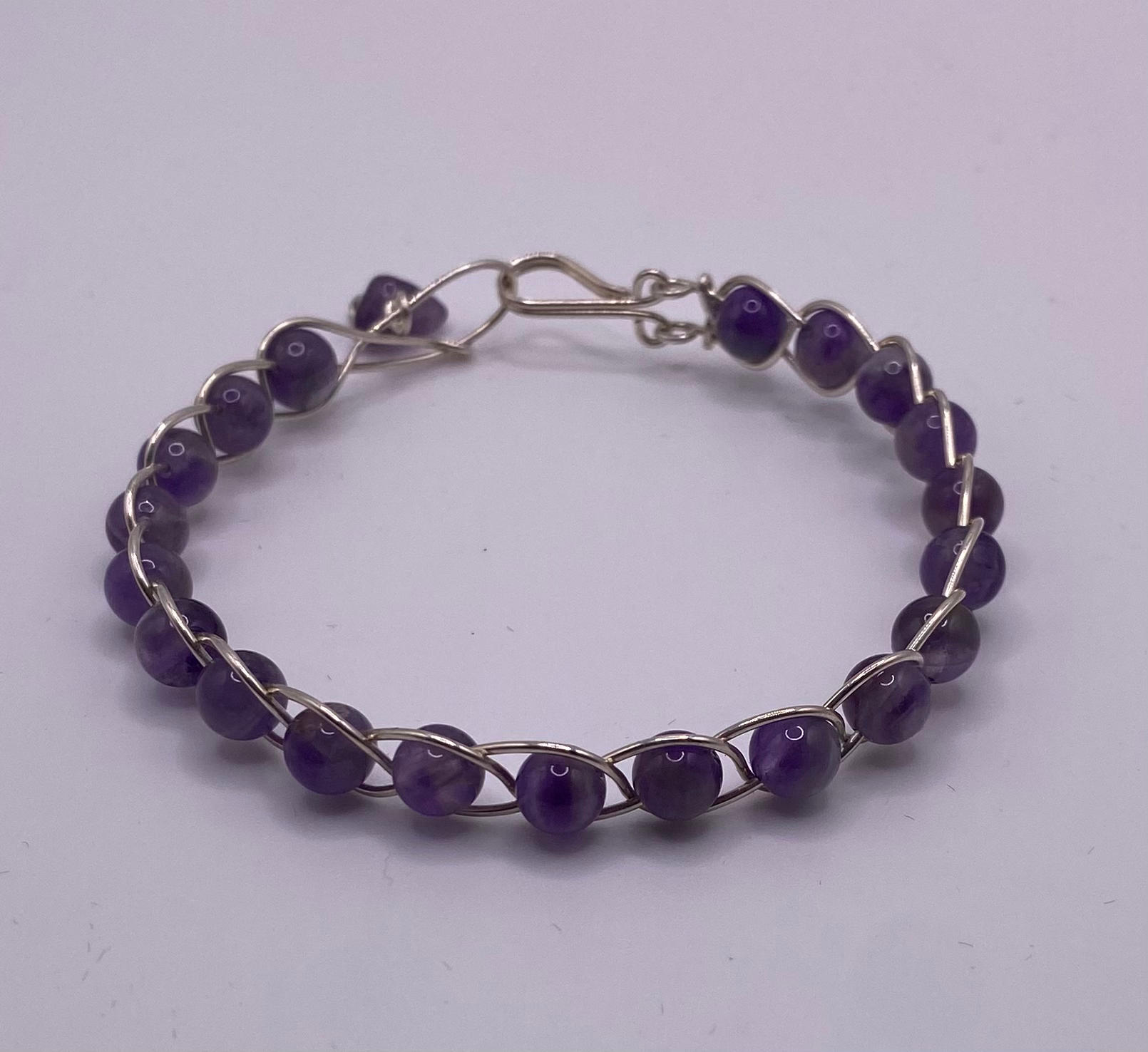 Sterling silver amethyst braided bracelet 