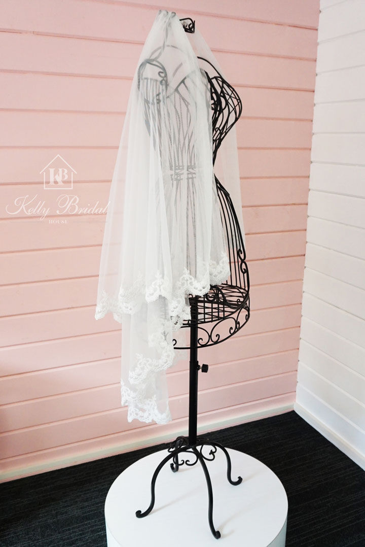 Thumbnail: Fingertip Length Full Lace Edged Wedding Veil