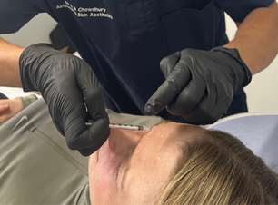 Dr Chowdhury injecting botulinum toxin to treat frown lines