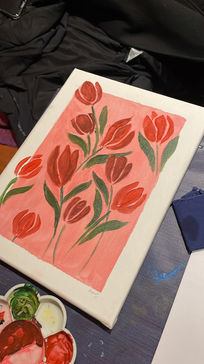 A students painting of tulips from a corporate sip and paint class