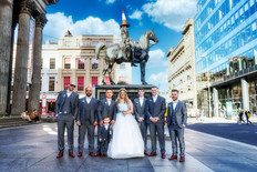 The Bride & Groom With Groomsmen. Wellington Statue, Glasgow