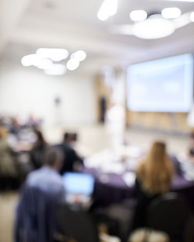 blurred-defocused-audience-blur-business-conference-presentation-conference-room.jpg