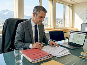Consultant reviewing documents in Swiss office