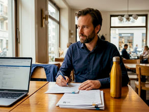 Entrepreneur reviewing forms in Zurich business center