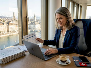 Executive working on Swiss tax report