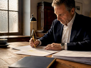 Swiss compliance officer reviewing legal documents