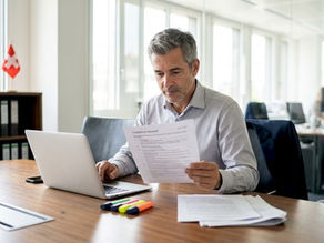 Executive reviews compliance checklist in Swiss office