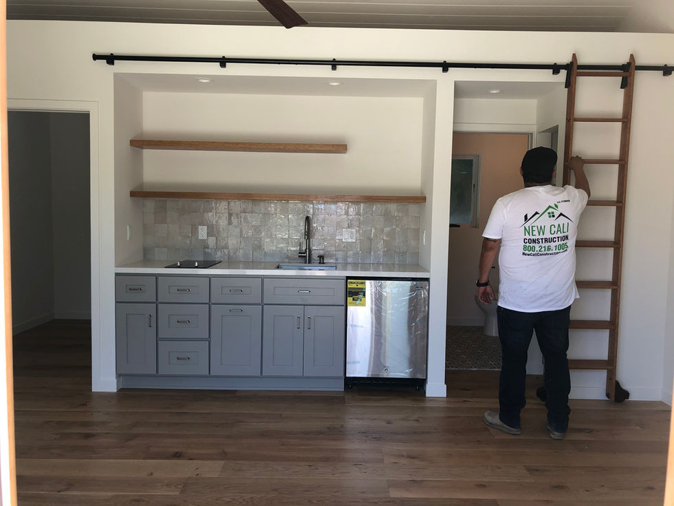 Detached garage conversion ADU in Culver City featuring modern interior and French doors - Kitchenette