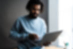 confident-afro-american-man-working-on-laptop-2025-02-16-01-47-36-utc.jpg