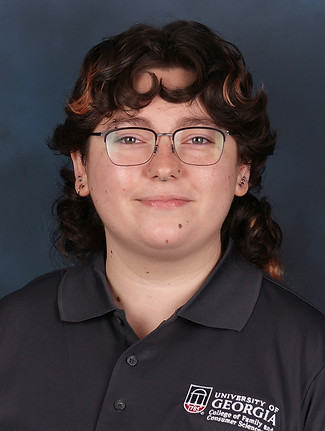 Deniella Tenenbaum Headshot Square Gray Grey.JPG