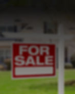 Photograph of a home for sale sign