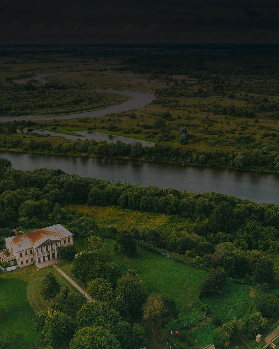 Aerial photograph of green land and a river