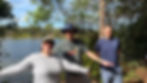 Three participants pose happily by the water, ready and enthusiastic before embarking on their big hike.
