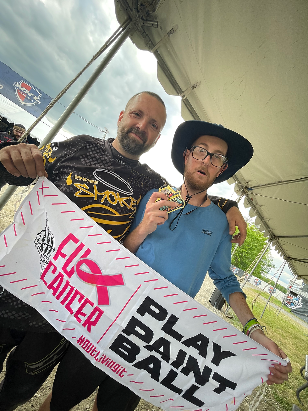 Celebrating with my new friend Will after Smokes ' 3-man win in Amateur Xball, posted up with the F Cancer Banner for our friend Danny Manning!