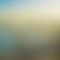 Scenic view of the Akko coastline and palm trees at dusk.