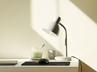 Neutral laptop and desk set-up.