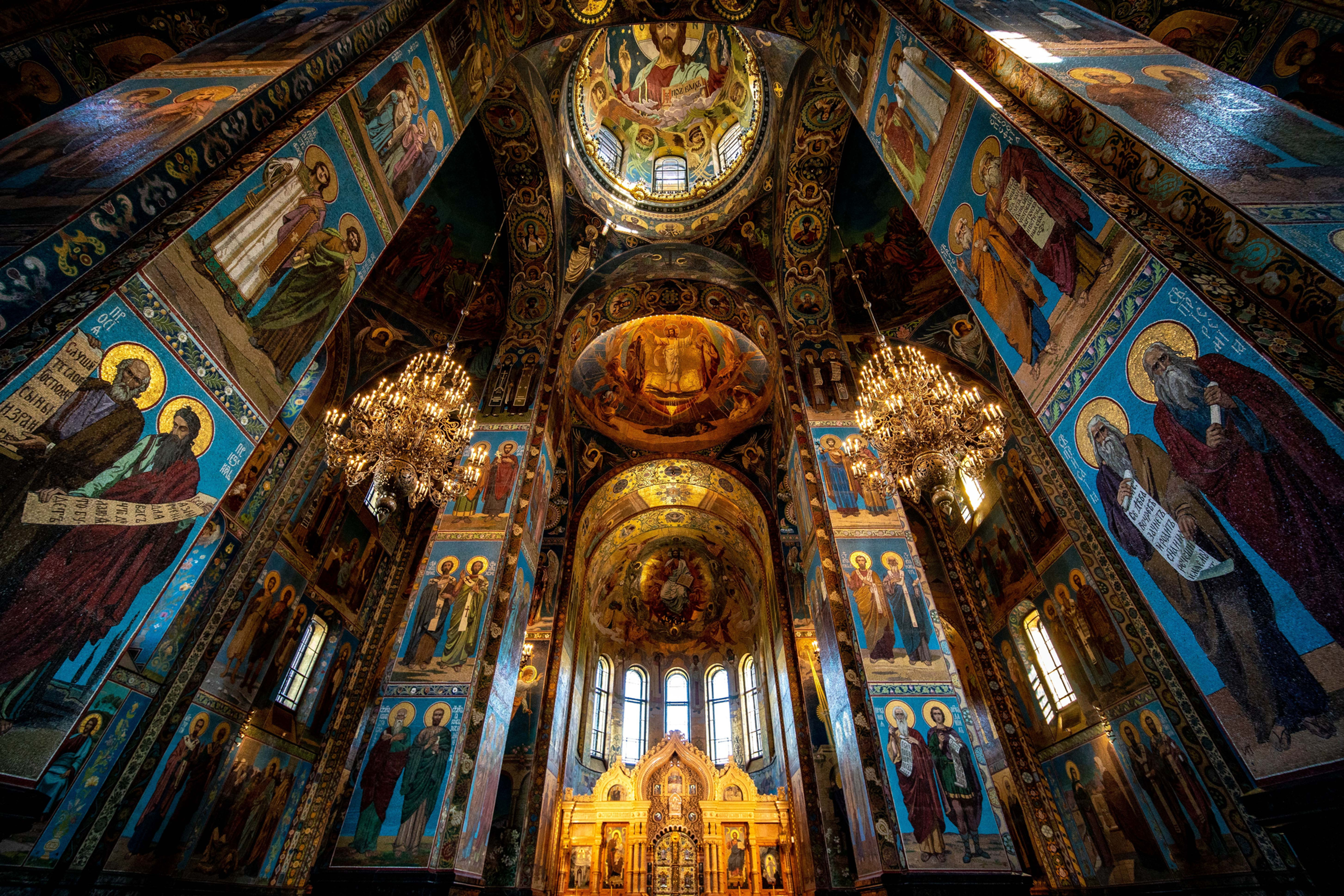 Ornate Russian church interior with detailed mosaics