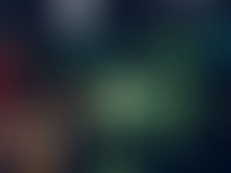 Raindrops on a window with blurry city lights in the background. Dark, moody atmosphere with reflections of colored lights.