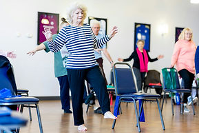 Older women taking part in chair exercises 