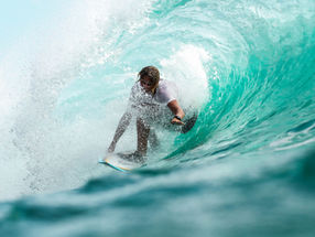 Imagine yourself under a palm tree, waxing your board, ready to face the sunshine and swelling waves