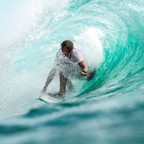 Imagine yourself under a palm tree, waxing your board, ready to face the sunshine and swelling waves