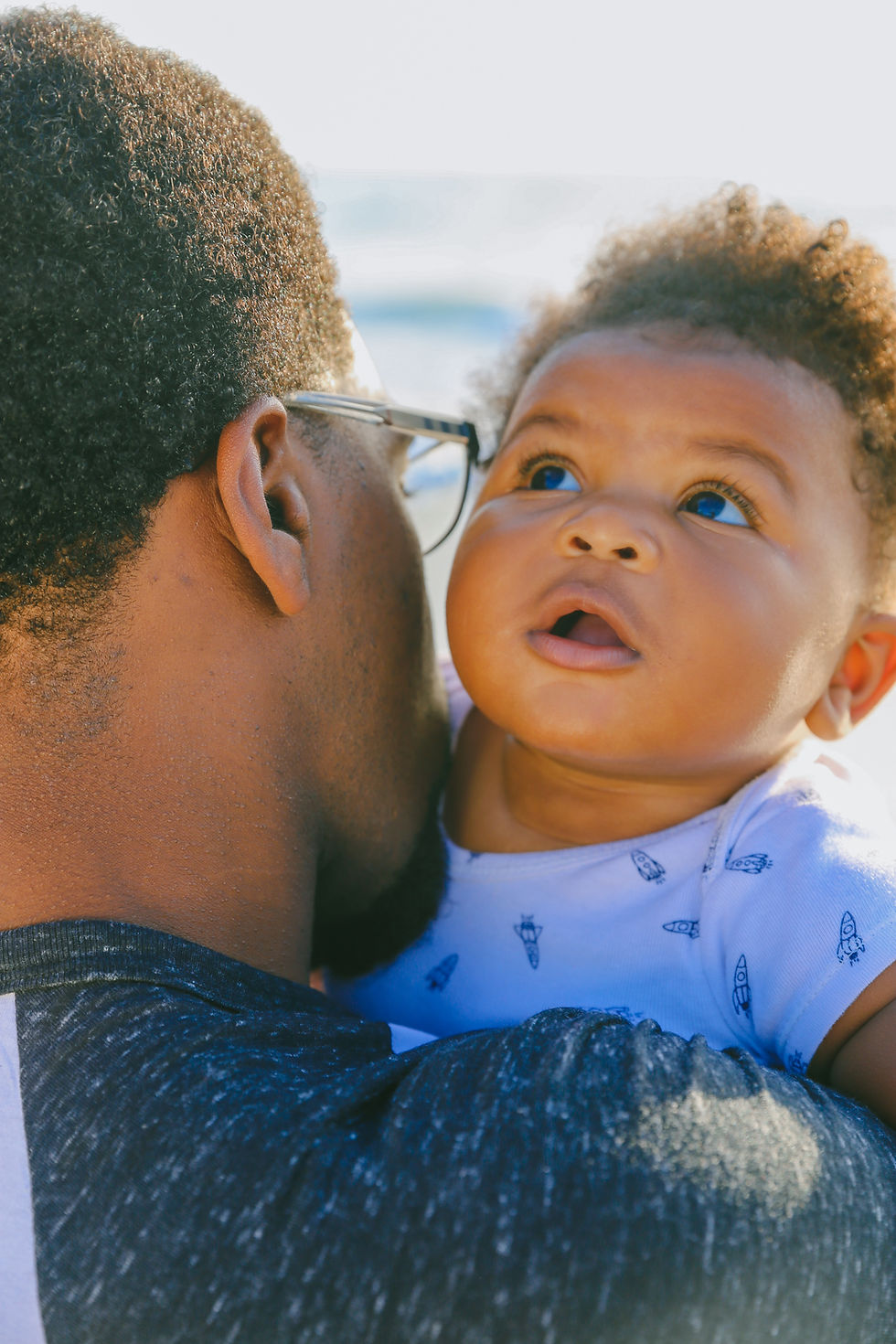 Dad holding baby