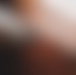 A person sealing a window while renovating their home