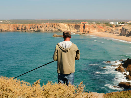 A man standing on a cliff