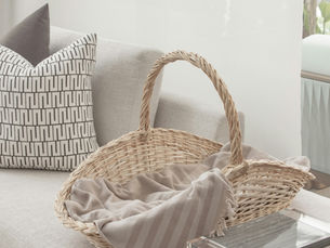 rattan basket and natural materials in coastal decor