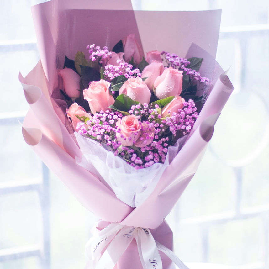 Pink roses bouquet with wrap, Lavender Dreams, presented by flower shop.