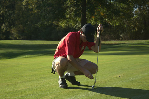 Golfer takes a moment to reflect on his mental training on the 18th hole