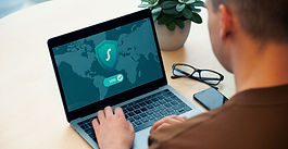 Project controls worker on laptop