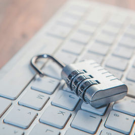 Security lock on keyboard representing CRA account login and password protection