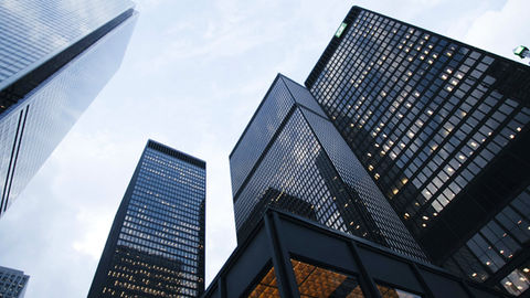 Modern skyscrapers against a cloudy sky