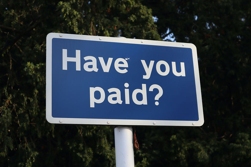 Blue sign reads "Have you paid?"