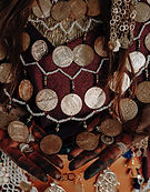 Close-up of traditional Tunisian necklace with metal coin ornaments