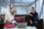 Two people discussing the impact of an immersive project