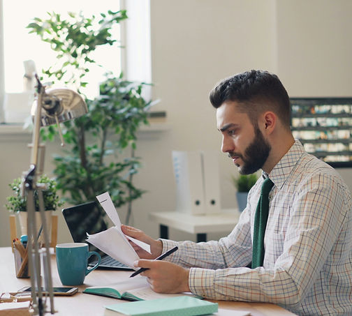 Man Reviewing document