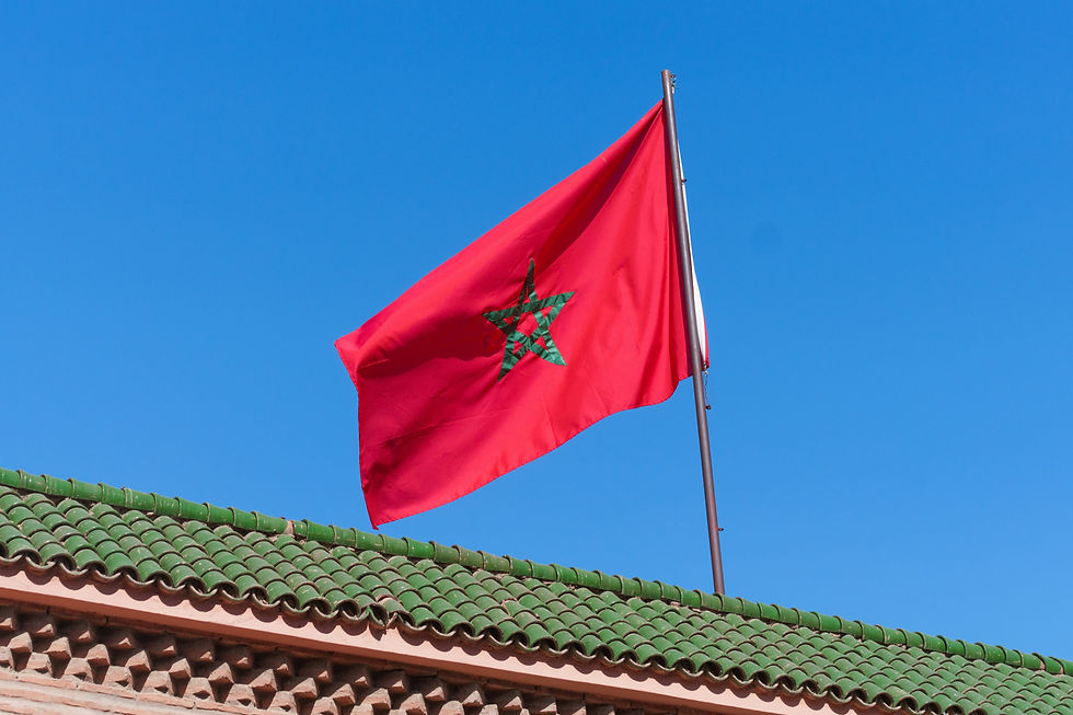 Close-up view of a Moorish flag hanging on a building