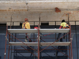 Construction workers on a scaffold