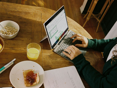Woman typing on her ipad