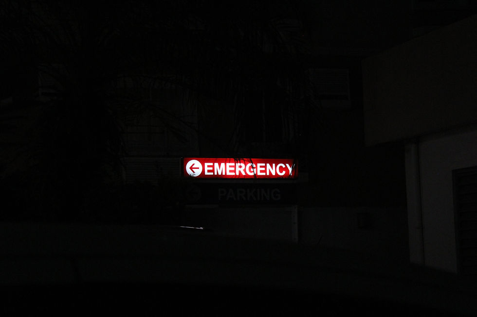 Emergency department sign reminding families to seek urgent medical care when needed.