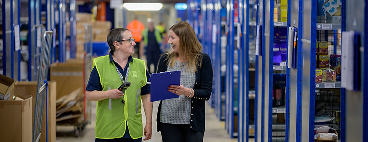 Staff at a storeage facility in Hereford discussing pest management