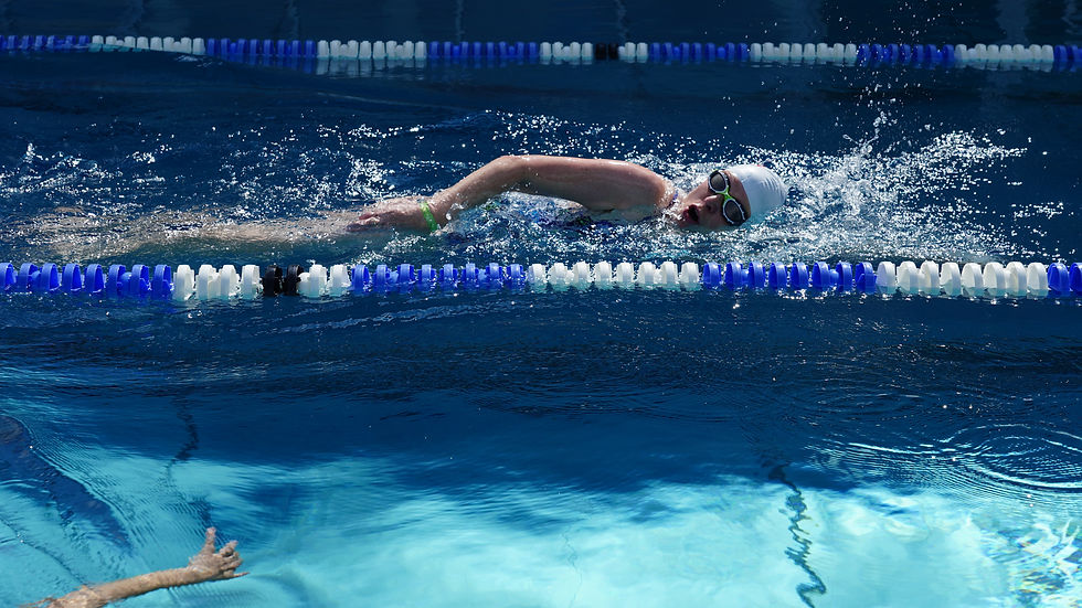 female swimmer swimming laps in the pool