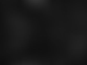 Snow falling against a black background