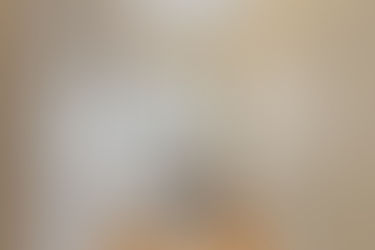 The evolution of American foyers and entryways in the 20th century.