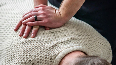 Physiotherapy clinic with practitioners treating patients
