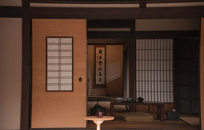 Wabi Sabi interior space showcasing rustic finishes and serene ambiance by Intriora Interiors